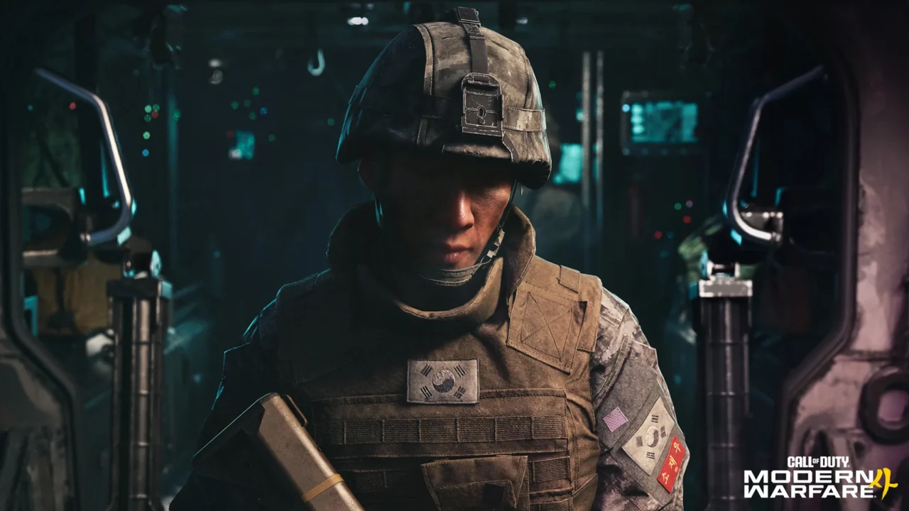 Soldado sul-coreano de capacete e colete com a bandeira da Coreia do Sul dentro de um veículo militar